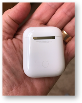 Airpods case showing button