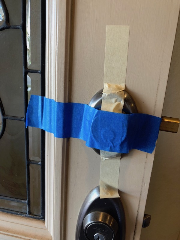 August Smart Lock tape on outside