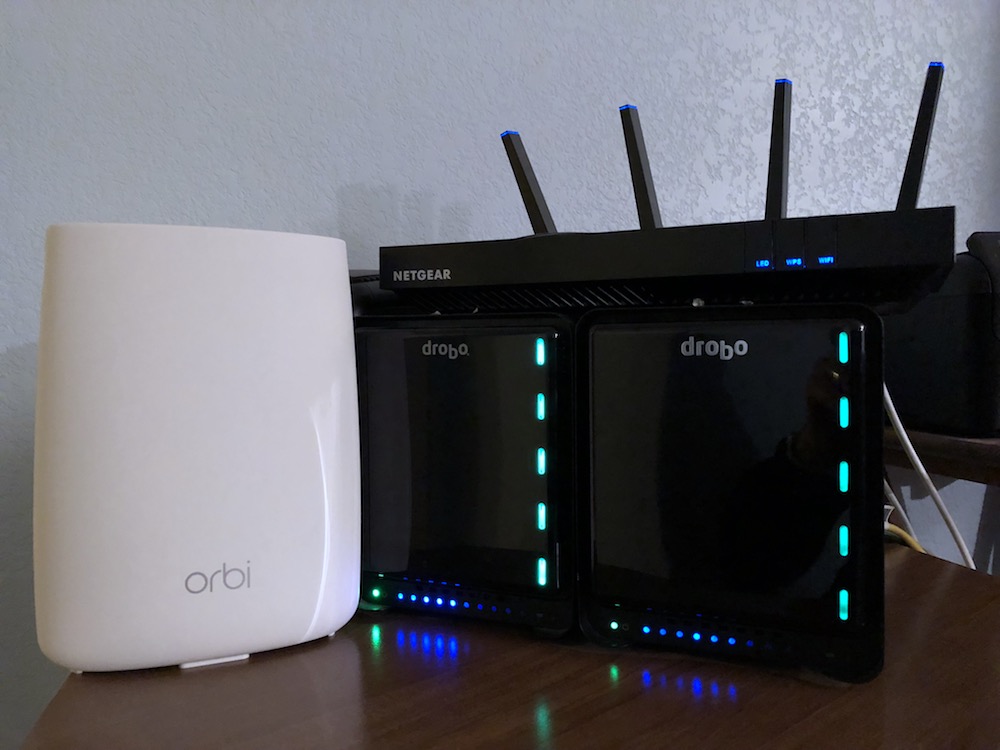 Orbi nighthawk side by side on top of drobos