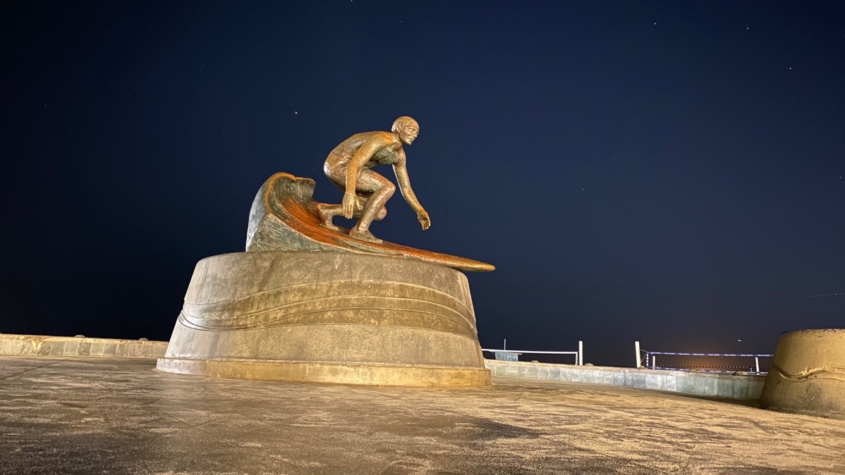 Surfer on Pier iPhone 11 Pro