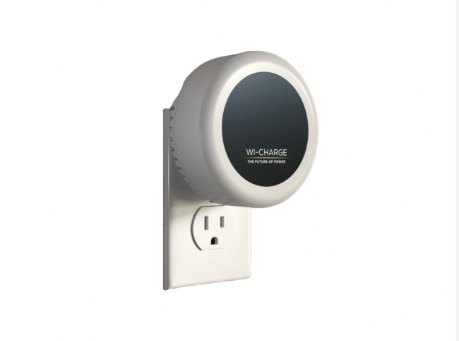 Wi-Charge Wireless IR Transmitter Plugged into Wall Outlet