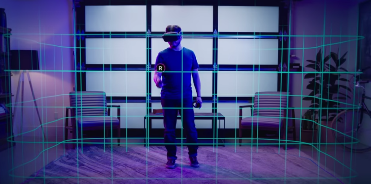 #title# man standing with controller and headset in a room with a green grid in space around him