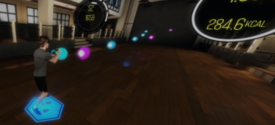 #title# Man on blue hexagon shooting turquoise and pink light out of the controllers with a score of 285 kCals