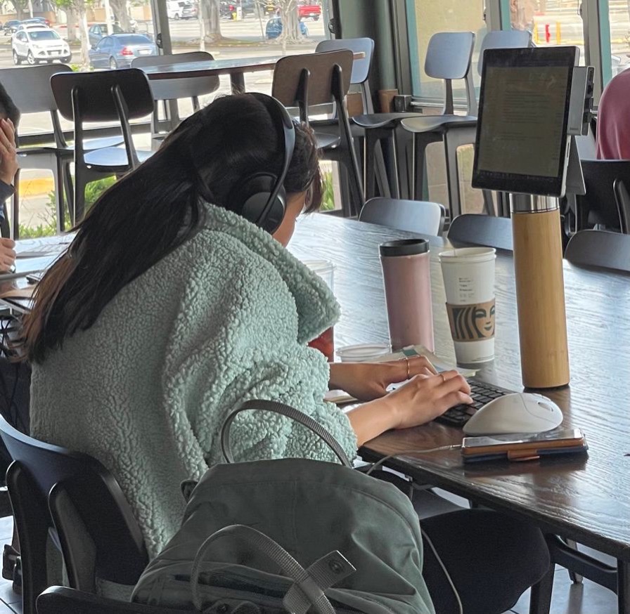 Tablet on top of tube at starbucks