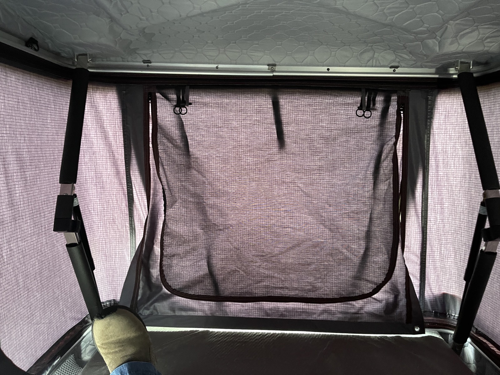 Inside the Roofnest Rooftop Tent basically showing netting