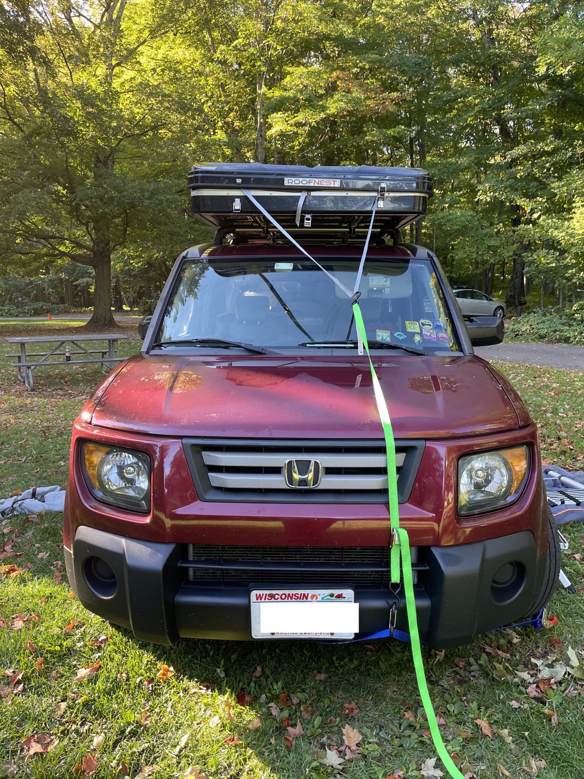 Straps holding the Roofnest Rooftop Tent down to the front bumper