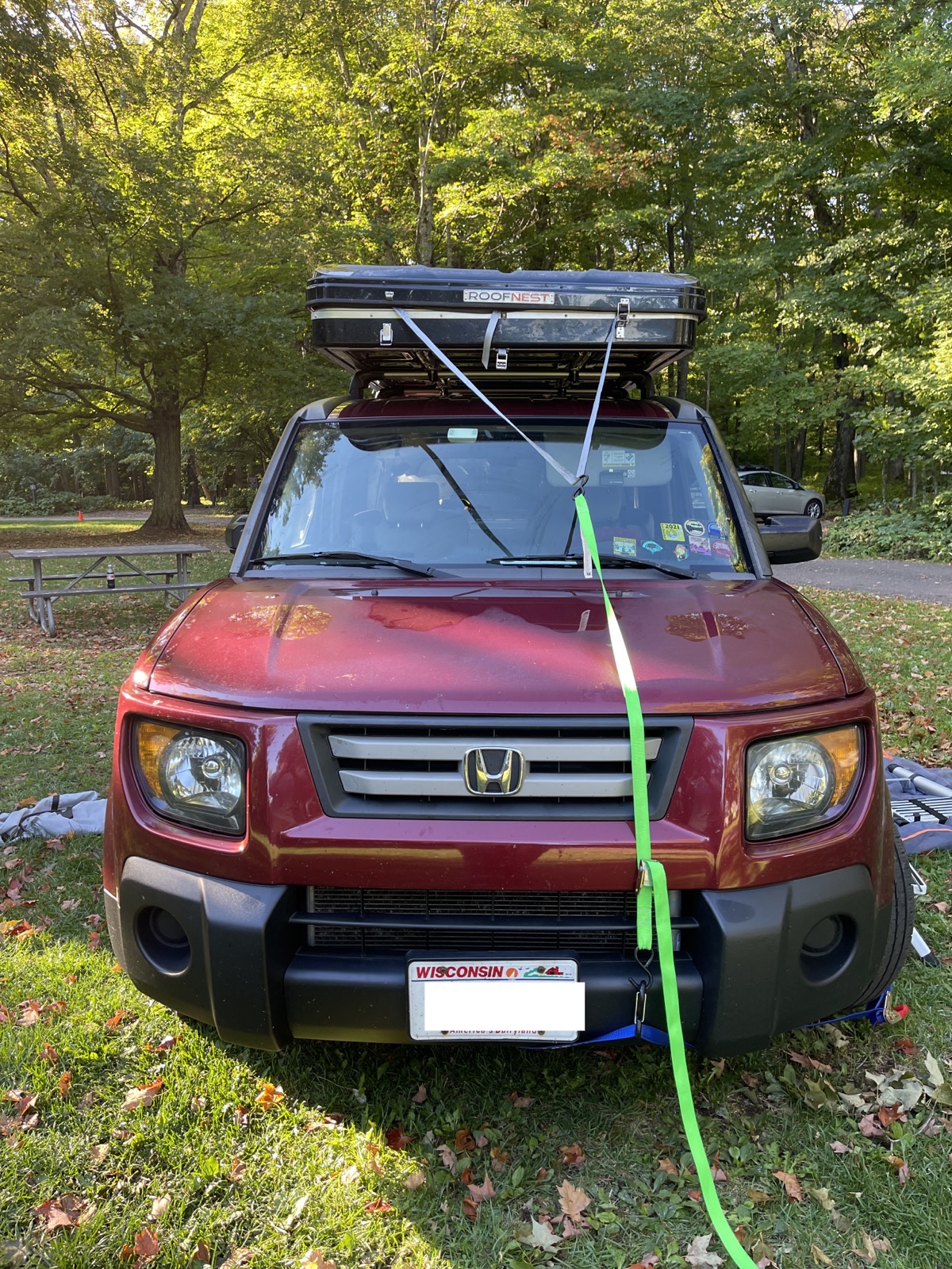 straps.JPG Straps holding the Roofnest Rooftop Tent down to the front bumper