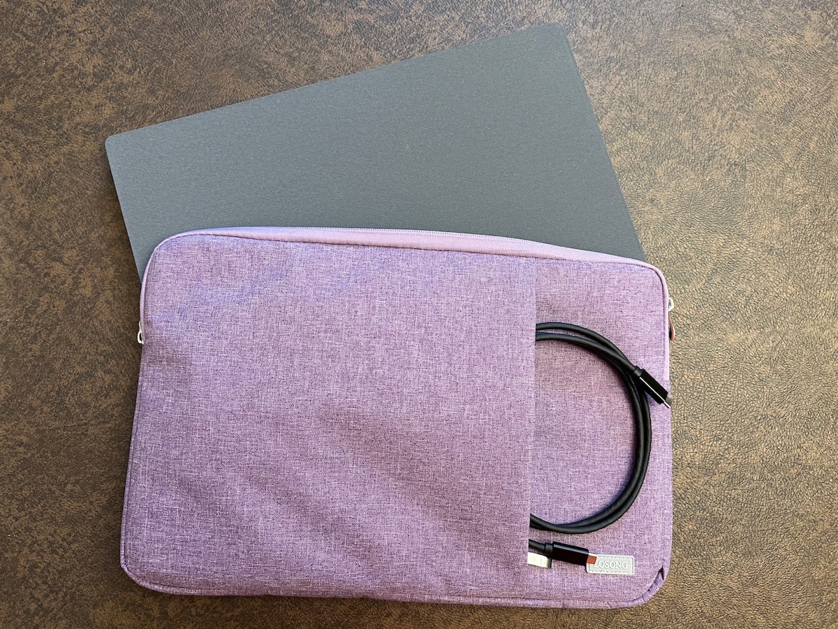 KYY Display Slipping into Losong carrying case - USB-C cable is shown slipping into the pocket