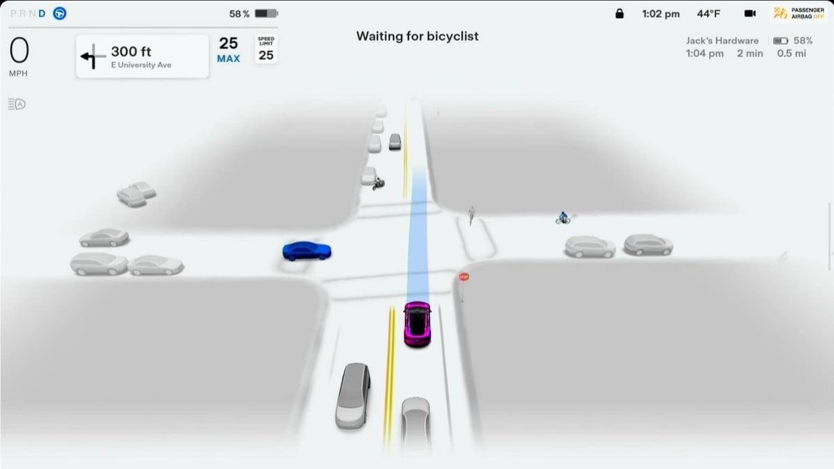 FSD 11 showing cars at an intersection