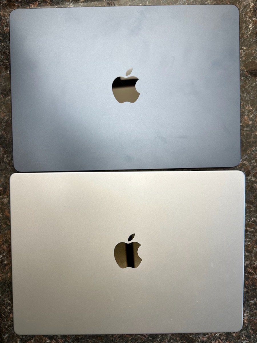 14 MacBook Pro Space Grey vs 13 Midnight M2 MacBook Air Covered in Fingerprints