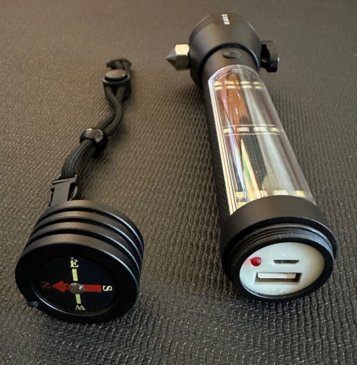 Spurtar Flashlight Showing Compass and charging Ports