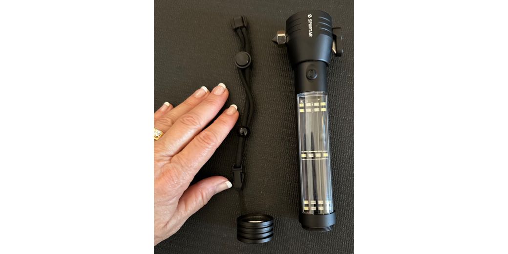 Spurtar Flashlight with Hand for scale. described in detail in the article