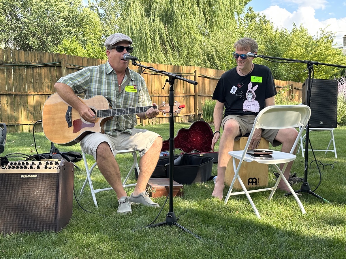 Mike LaPlante on Guitar Dave Hamilton playing a box as a drum