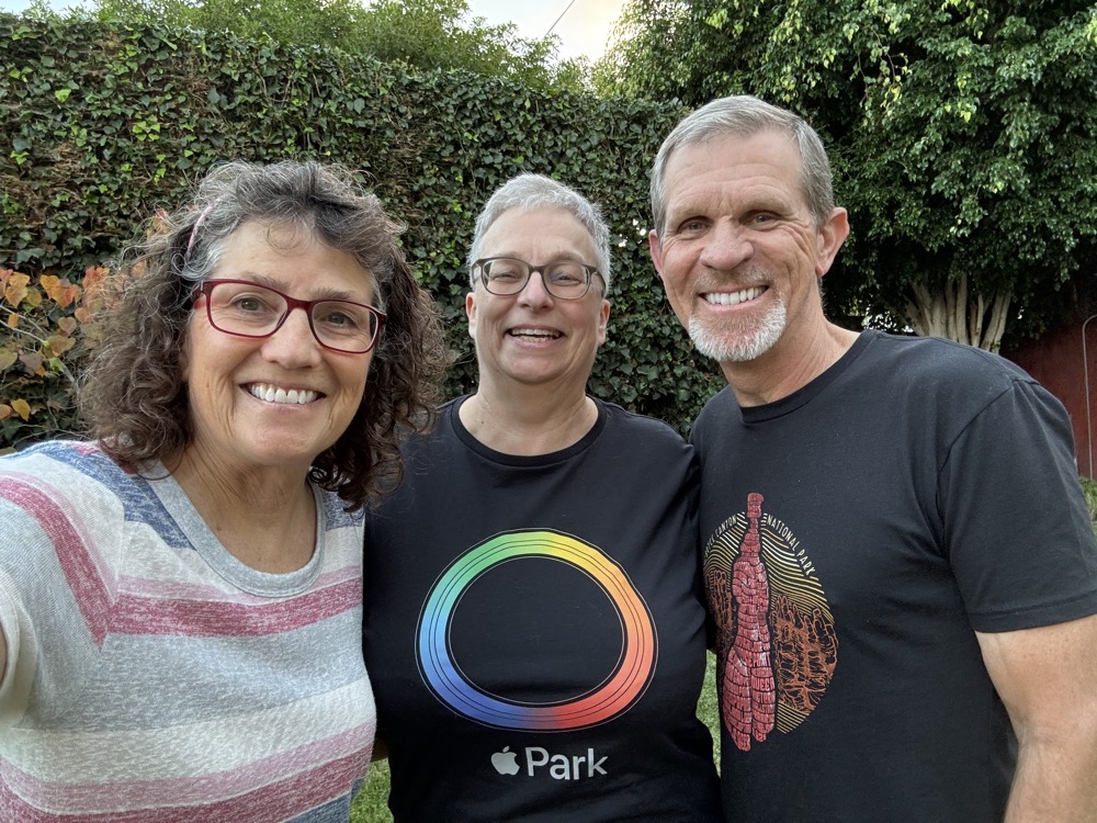 Allison Helma Steve in our back yard. Helma has on an Apple Park t-shirt