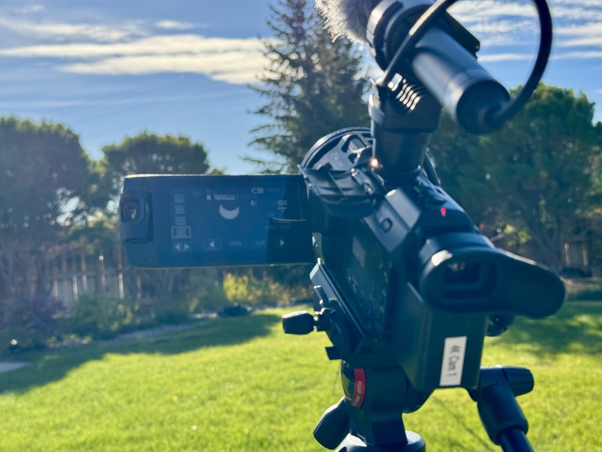 Camcorder where we can see the eclipse happening on the viewing screen off to the side