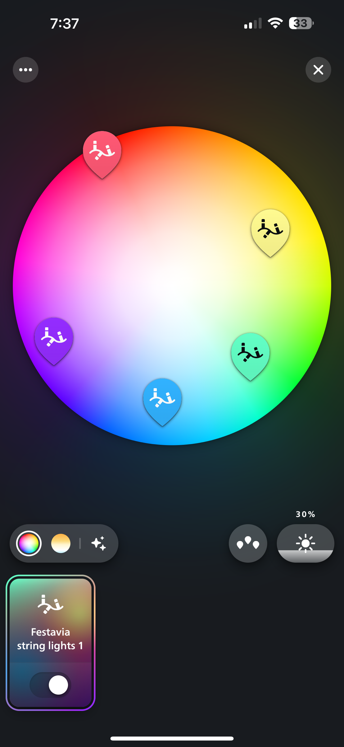 Hue colors showing a color wheel with 5 strings of lights icons sprinkled about it