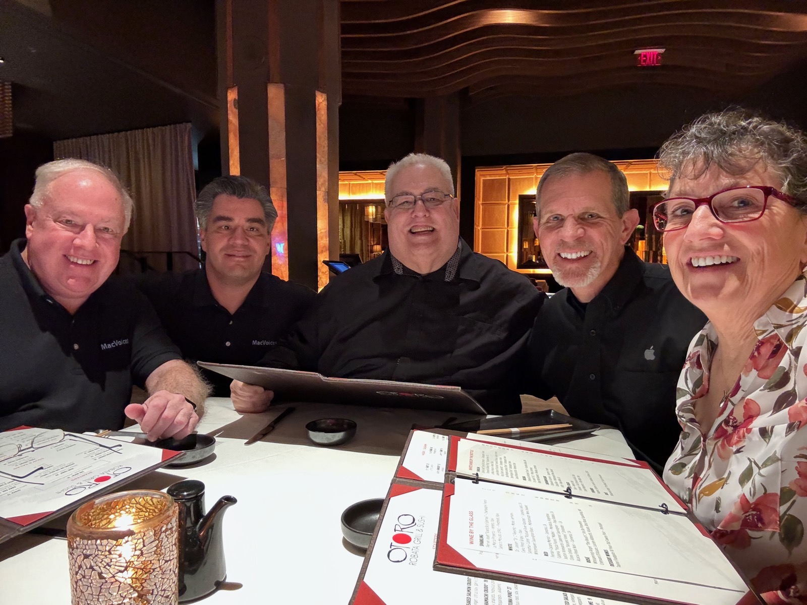 Chuck Norbert Victor Steve Allison around a fancy dinner table.