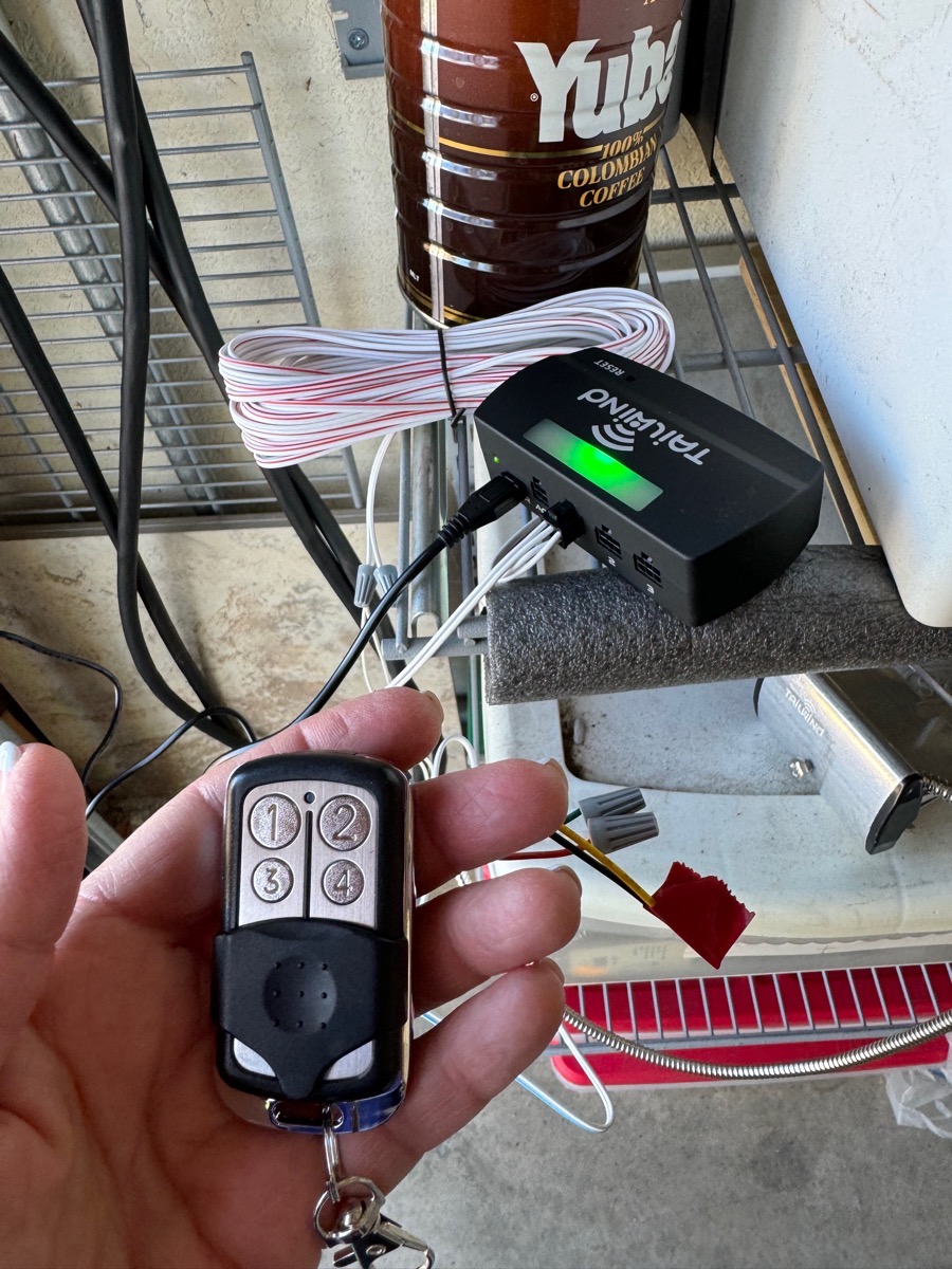 Tailwind Clicker connected to controller showing wire nuts and coiled wire.