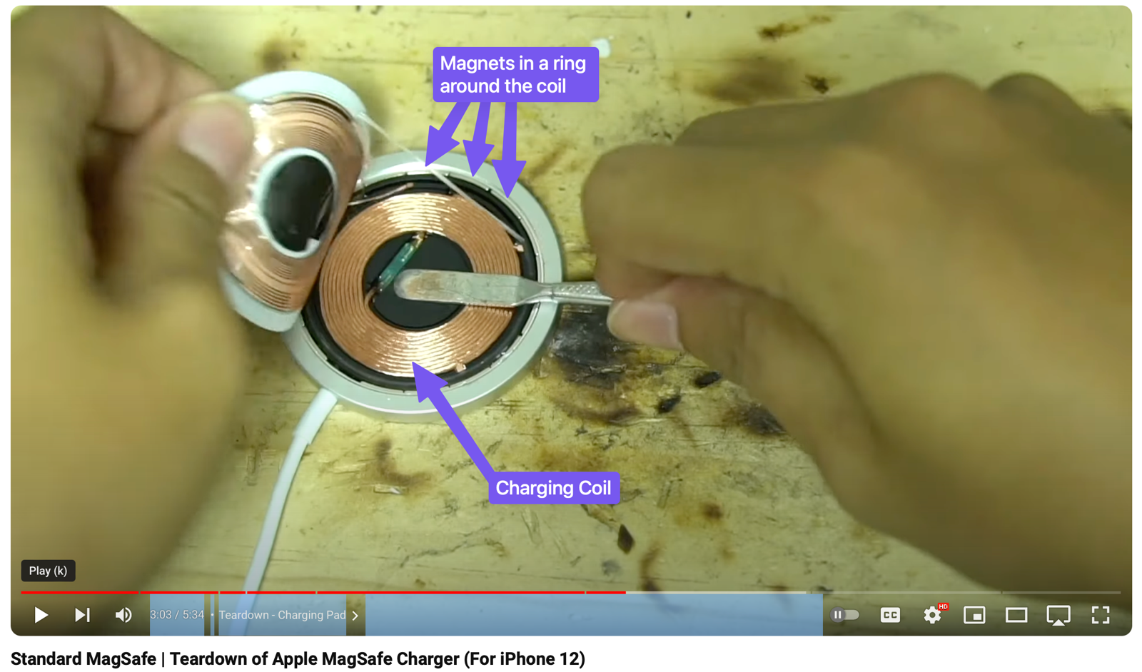 Coil and magnets inside MagSafe Charger from iFixit Teardown video.
