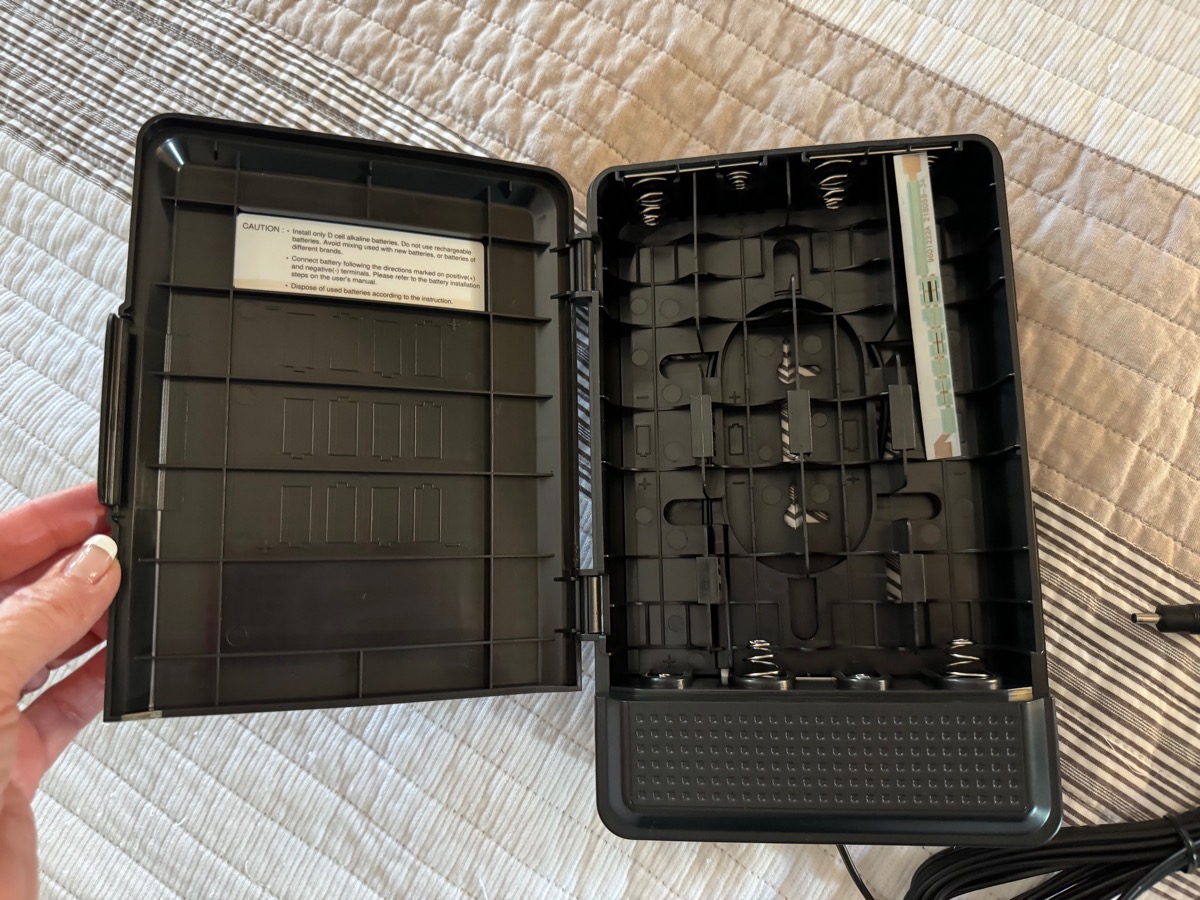 Frontier Battery case for ONT open showing slots for d batteries.