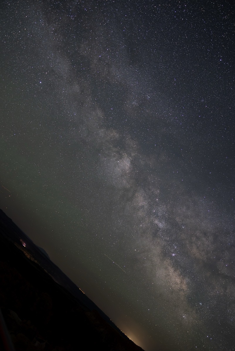 you can see the Milky Way edge on as it rises over the mountains. The colors of the gas and dust clouds are amazing. The stars are too many to count and it spans the entire sky from north to south. It takes your breath away.