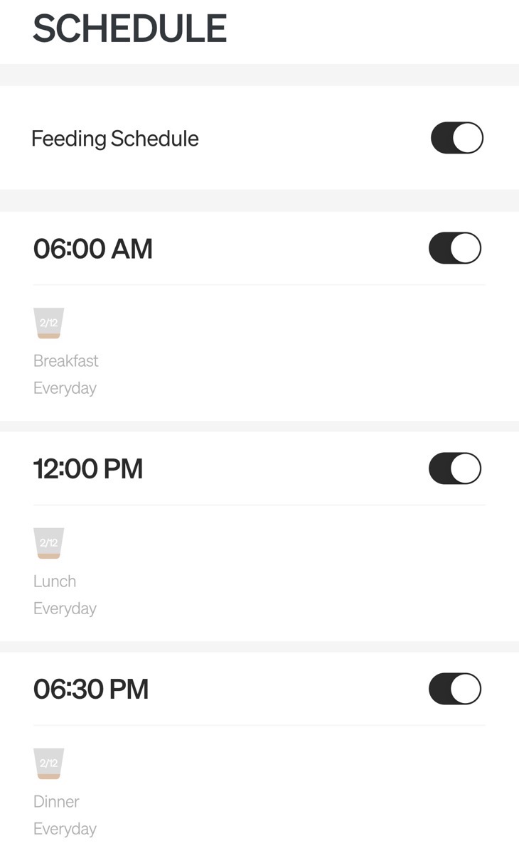 Feeding schedule set for breakfast lunch and dinner with toggles next to each one.