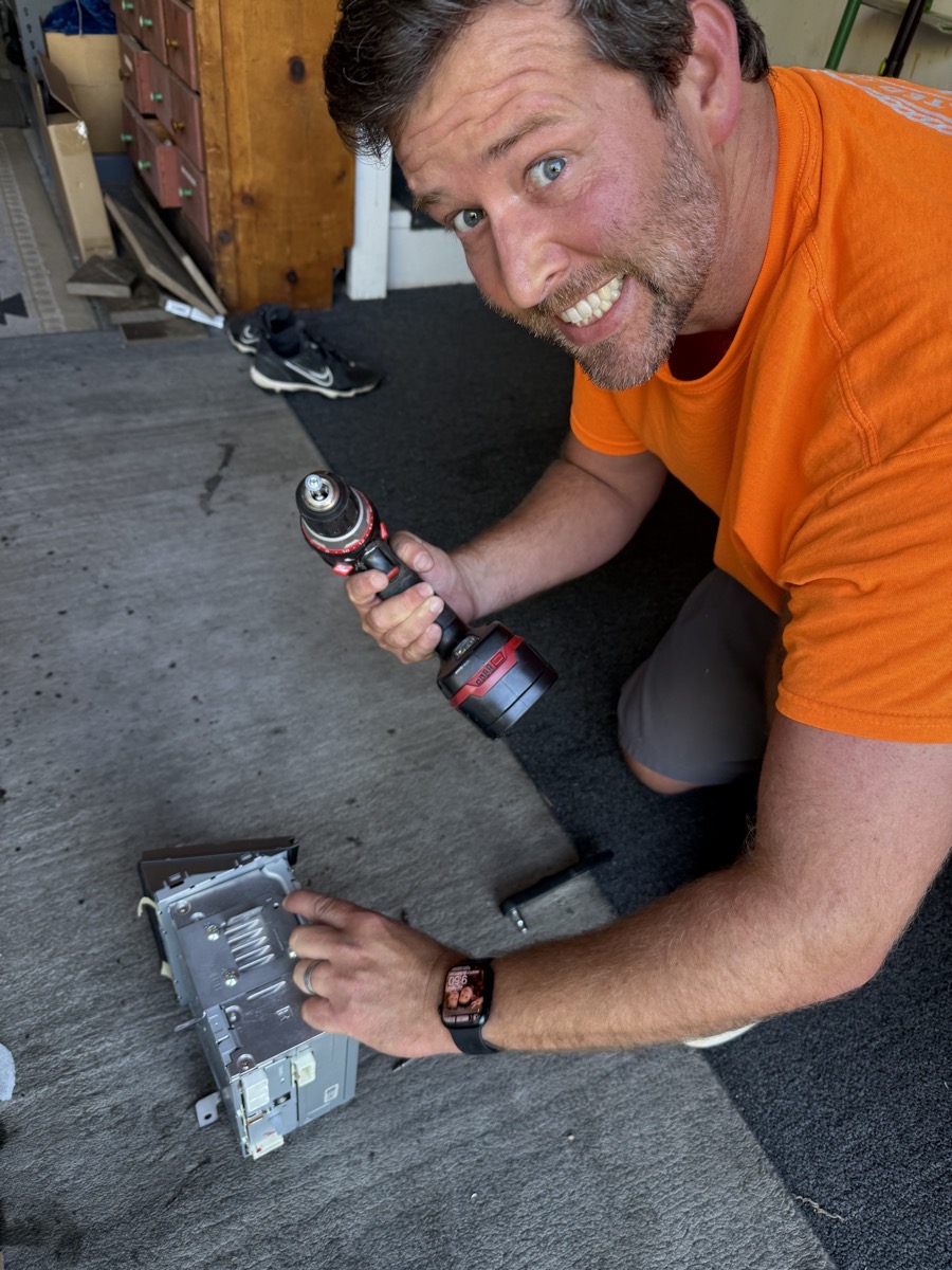 Nolan gleefully about to drill into the head unit.jpeg Nolan gleefully about to drill into the head unit.