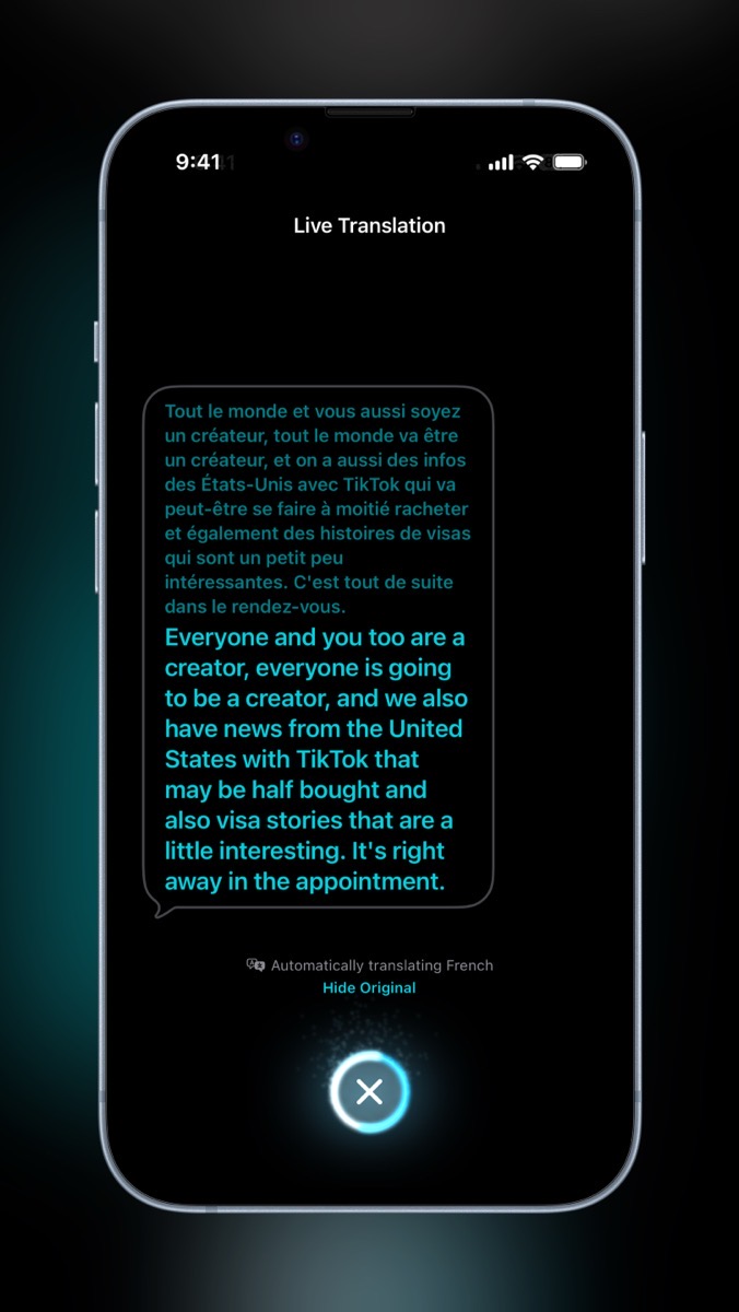 iPhone showing live translation of Patrick Beja. Top of the thought bubble is in French and bottom is brighter and in English.jpg IPhone showing live translation of Patrick Beja. Top of the thought bubble is in French and bottom is brighter and in English.