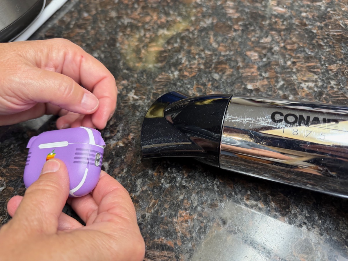 Sliickwraps AirPods Pro and hairdryer.jpeg Sliickwraps AirPods Pro and hairdryer.