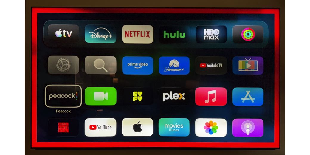 Apple TV screen showing a giant 2 inch border of red around it indicating that the screen is being viewed by Apple support. i am very curious what someone would hear on VoiceOver for the same thing.
