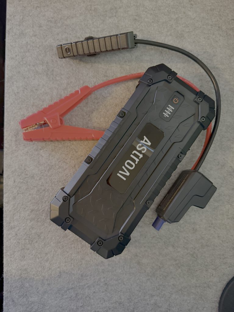 rectangular box maybe 6-8 inches long with two jumper cables sticking out the sides