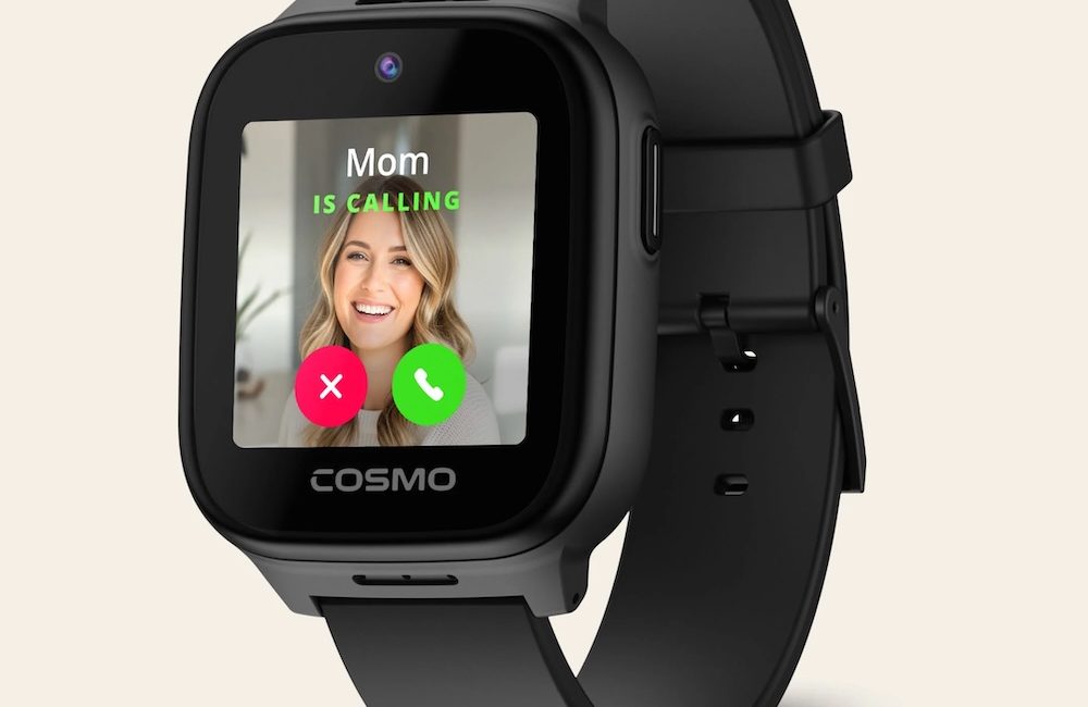 Black smartwatch with a silicone band shown against a neutral background. The screen displays an incoming call from “Mom,” with a smiling woman’s photo and red decline and green accept buttons. The brand name “COSMO” appears below the display.