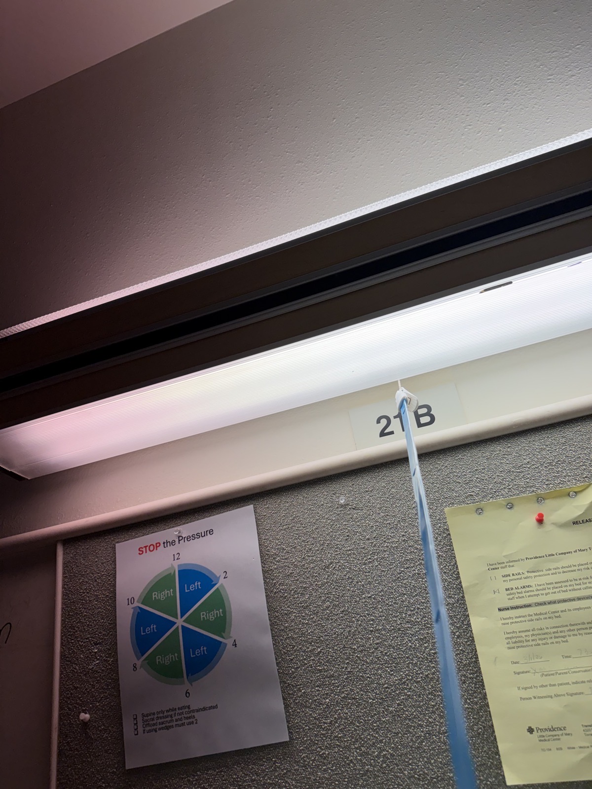 Loud hospital light blue tape hanging vertically.jpeg Loud hospital light blue tape hanging vertically.
