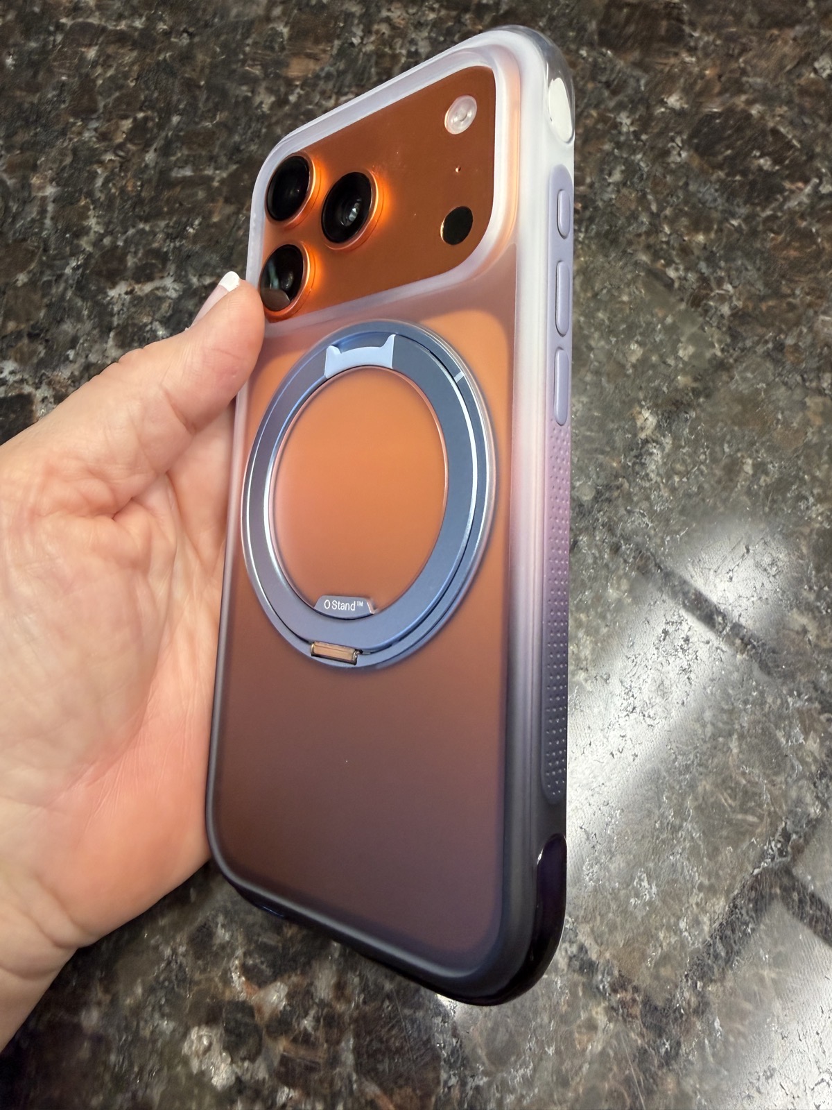 Orange phone purple case greyish buttons.