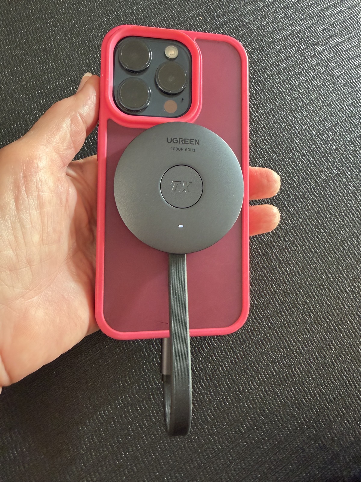 UGREEN Transmitter magnetically attached to iPhone and USB-C.jpeg UGREEN Transmitter magnetically attached to iPhone and USB-C.