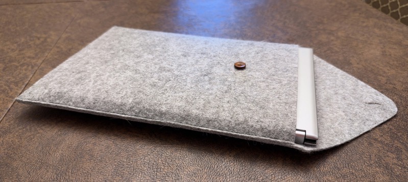 VG1457 in it's felt envelope with button.jpeg Felt envelope with button but the flap is open with the VG1457 slid out a little bit