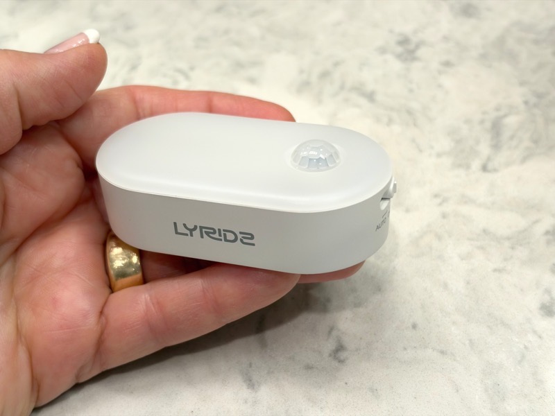Lyridz in palm of my hand showing light sensor and switch.jpeg Lyridz in palm of my hand showing light sensor and switch.