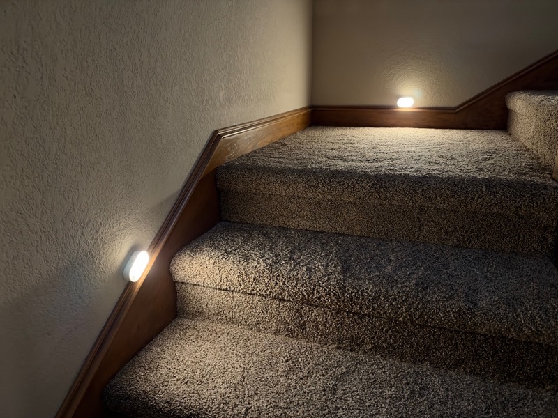 Lyridz motion sensor lights stairwell.jpeg Lyridz motion sensor lights in the stairwell showing one mounted diagonally and one mounted horizontall on the landing